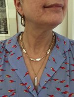 Reborn necklace and earrings wore with a Kojima feather pendant. I liked them with the fish on the blouse.