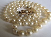 pearl necklace 14k gold clasp rectangle with pearl whole on paper good.JPG