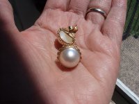 Mom's mabe studs in my hand forum.jpeg