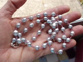 baroque blue pearls with rhodolites on wire.jpeg