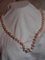 Freshwater 'granulated' cultured pearls (undyed) on silk with 22ct gold beads and 14ct gold clas.jpg