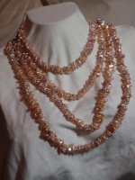 Undyed freshwater cultured pearls (keshis) single long strand.jpg