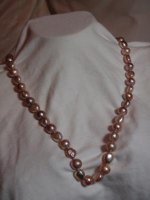 Undyed freshwater pearls on silk with sterling silver.jpg