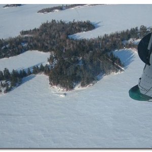 Aerial view of the Island in winter. 41 acres of wilderness, lots of wildlife present: beaver, moose, deer, black bears , mink, martin, otters, loons,and white pelicans. The island has an active bald eagle nest on it also!
