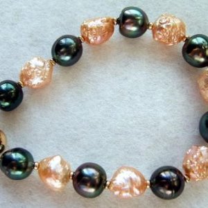 Kamoka Black Tahitians With Rich Apricot Rosebud Freshwater Pearls