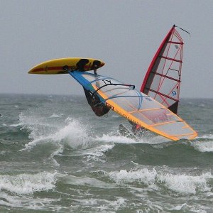 Windsurfing in Brittany. Doing a backloop.