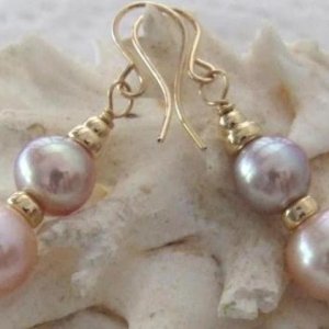 FatBabyPinkButtonswithPurpleOffRoundsEarrings. To match 'BUBBLES' rope.