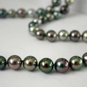 Tahitian pearl rope made from 3 Tara & Sons strands.