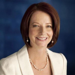 Australian Prime Ministher Julia Gillard official portrait wearing her favourite drop pearls and a smaller strand necklace.