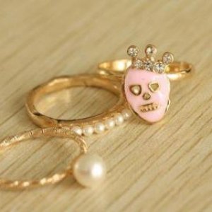 Pirate Pearls - three sweet rings that work separately but are designed to be worn together. Not real pearls, obviously but I think they are a nice modern funky twist with younger girls in mind. Skull icons have been hugely popular in the last few years.