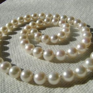 Freshadama strand, 7-8 mm, taken to help match with pearl earrings.