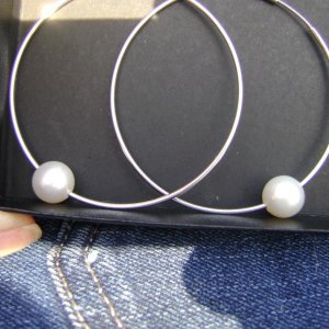 Camera kinda stinks, but these are my new 55 mm hoops with 10-11mm freshadama pearls.  I love wearing them because they are so simple, as opposed to my other pearl jewelry.
