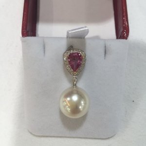 Pinkish white South sea pearl set with pink sapphire