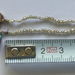 Incredibly tiny pearls,can’t imagine how they were drilled