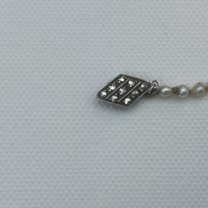 Very white bright marcasites,if you like that sort of thing……