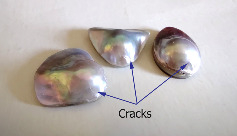 Mabe pearls with cracks