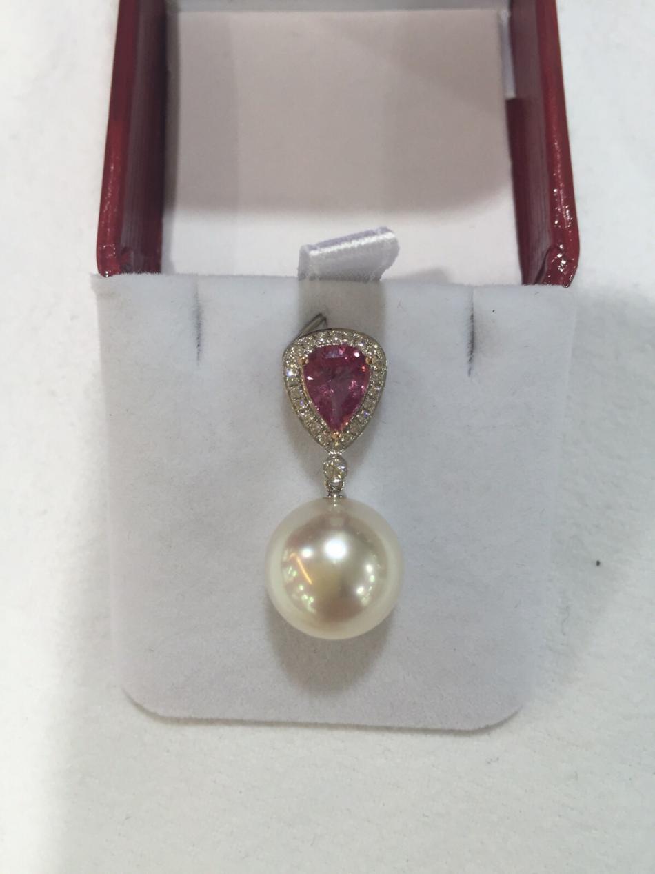 Pinkish white South sea pearl set with pink sapphire